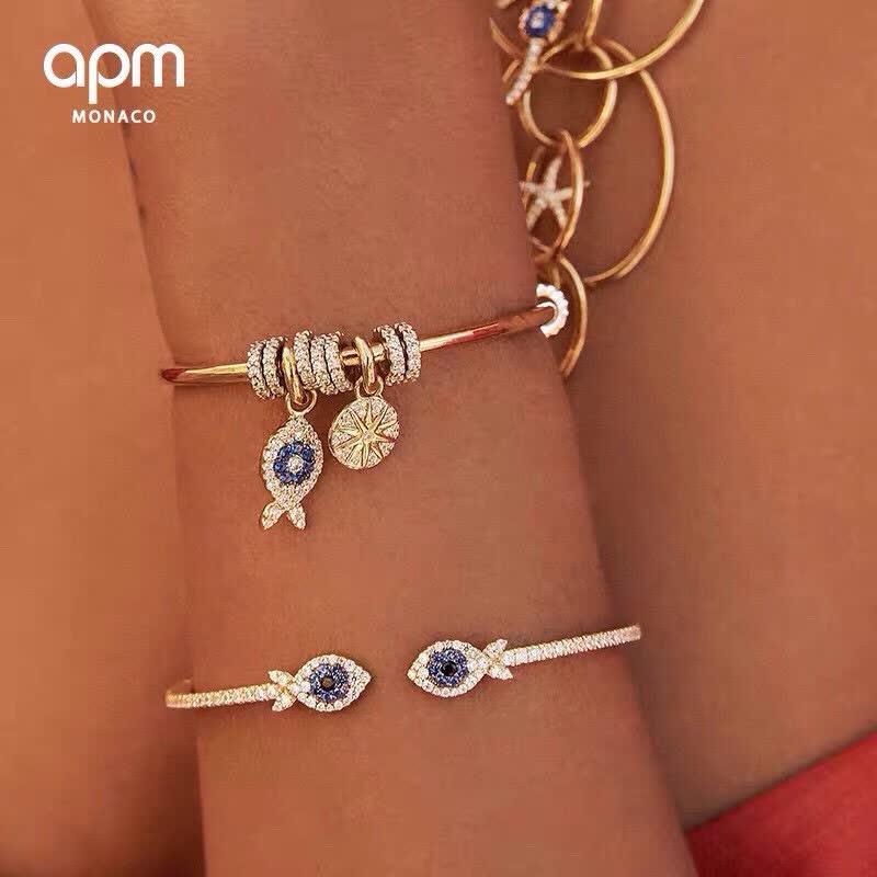 APM Monaco Gold Tone Bracelet with Fish and Star Charms